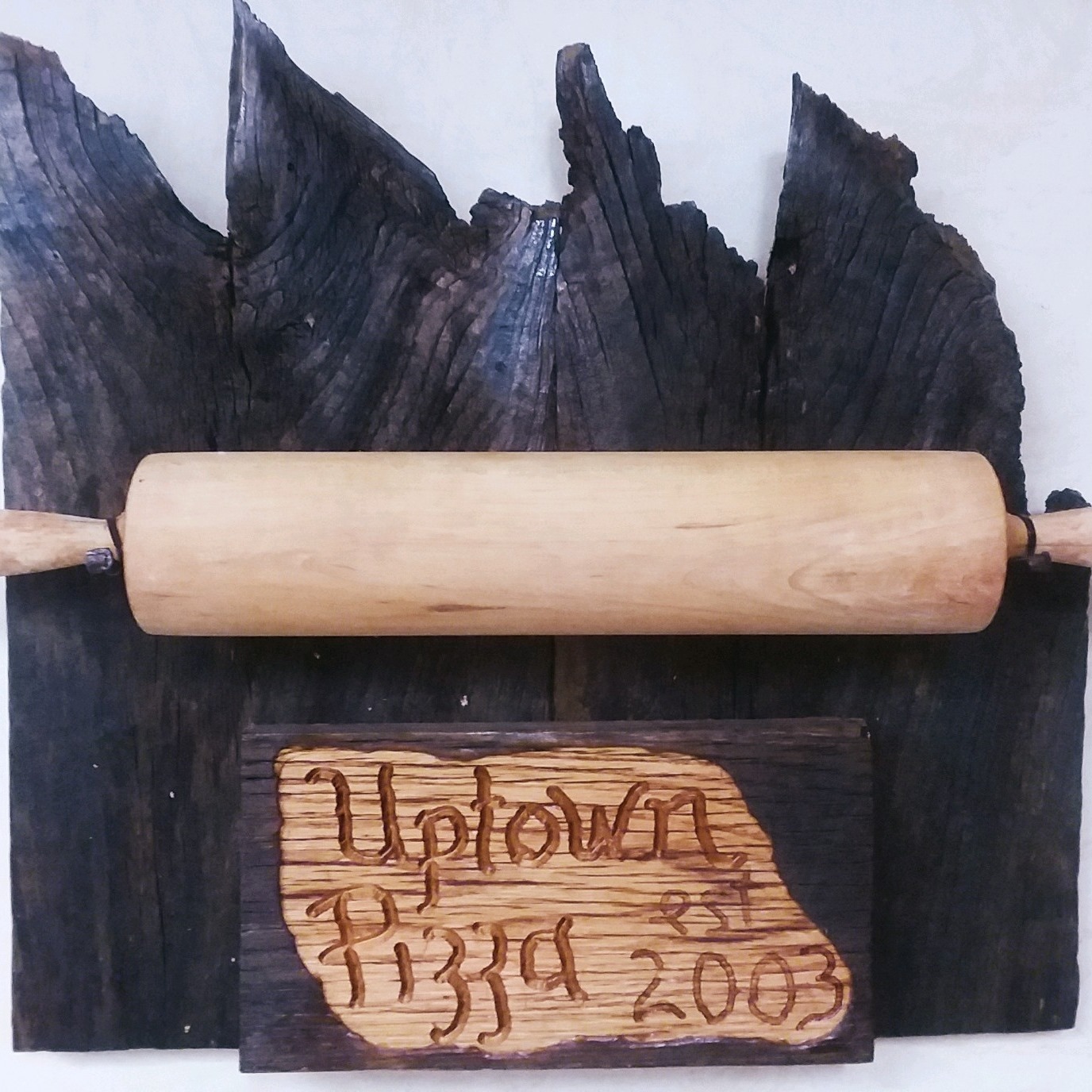 Uptown Pizza logo